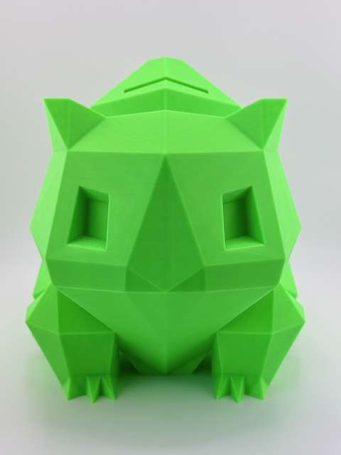 Low-poly 3D-printed Bulbasaur coin bank in rich bright green, featuring a coin slot and a removable cap at the bottom, standing 18 cm tall