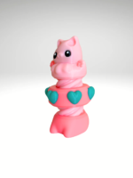 pink-cat-shaped-fidget-toy-with-bolt-mechanism-on-a-clean-surface.