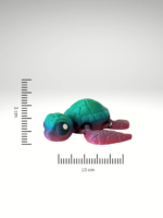 3D-Printed gradient-colored-turtle-with-a-bright-rainbow-shell-set-on-a-neutral-surface.