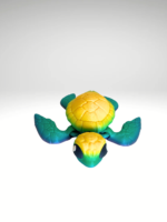 3D-Printed gradient-colored-turtle-with-a-bright-rainbow-shell-set-on-a-neutral-surface.